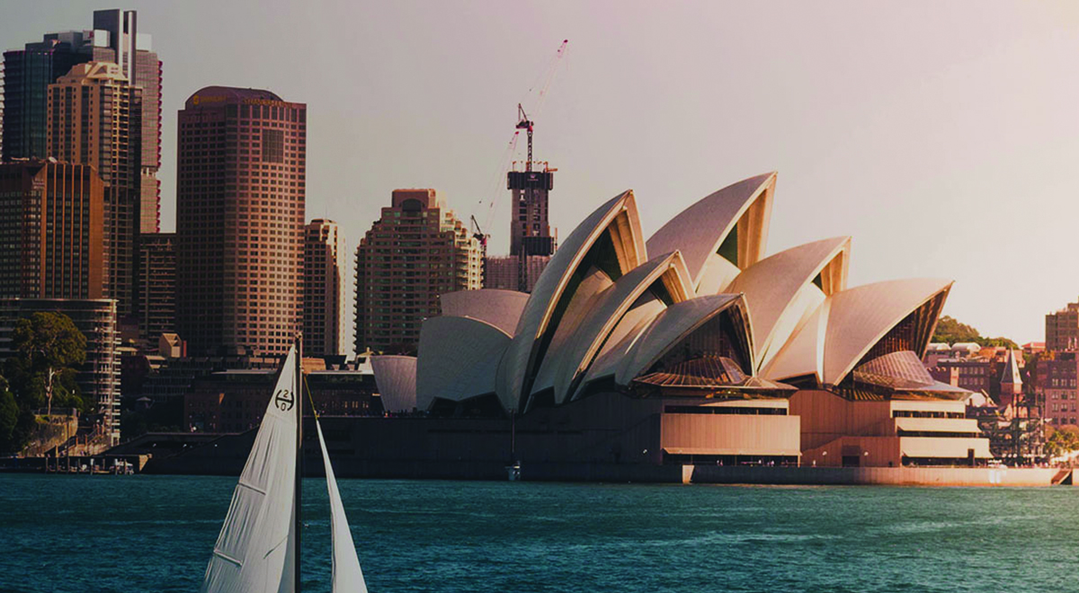 image of the sydney opera house across an ocean view
